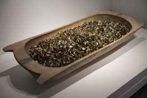 Bullets in a wooden bowl.